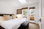 Primary bedroom: King bed and a TV